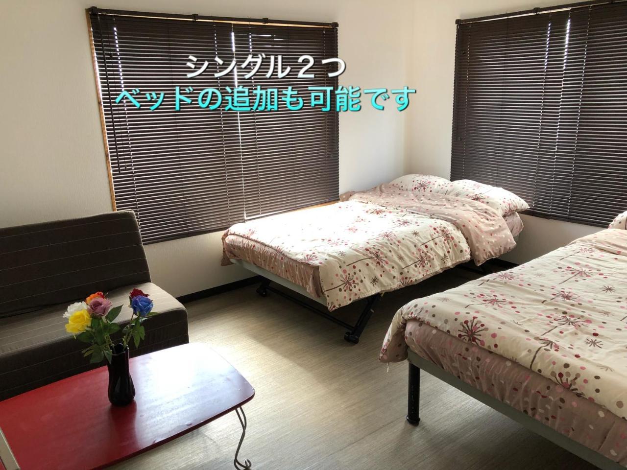 Yoko House Hotel Uruma Buitenkant foto