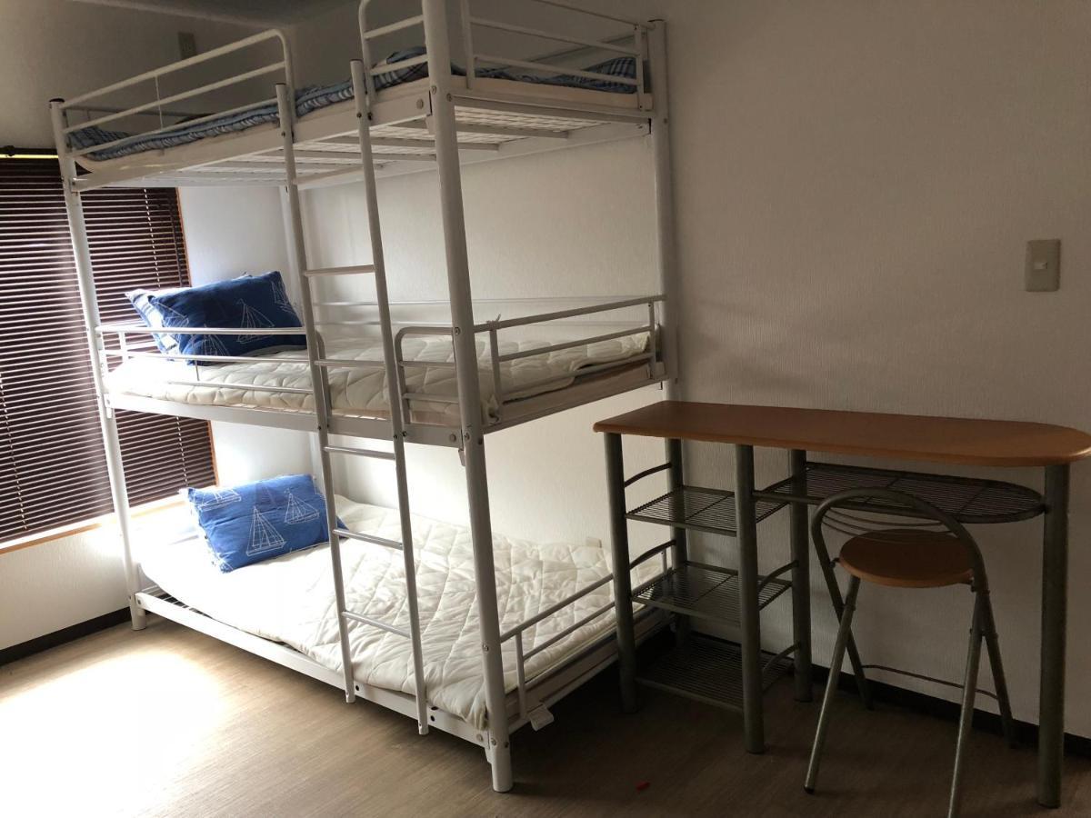 Yoko House Hotel Uruma Buitenkant foto